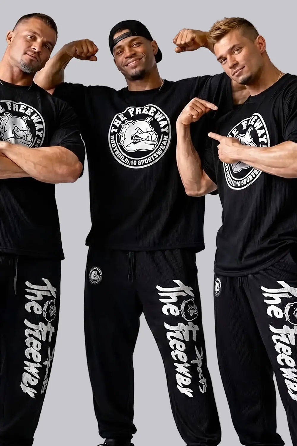 Men's black rounded bodybuilding rag top Thefreeway Sportswear art. 2272 worn by three bodybuilders, front view