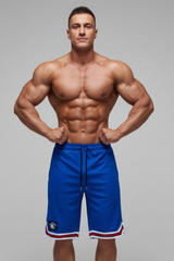 Men's blue basketball shorts Thefreeway Sportswear art. 1503 worn by a bodybuilder, front view