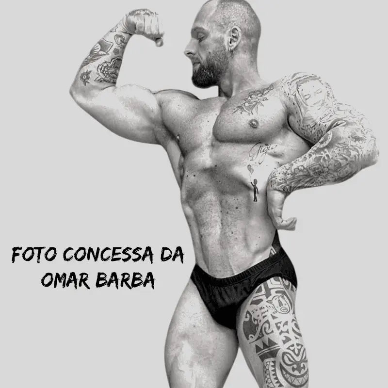 Thefreeway Men's Classic Physique Competition Posing Trunks in black Lycra worn by a male bodybuilder in a side flex pose