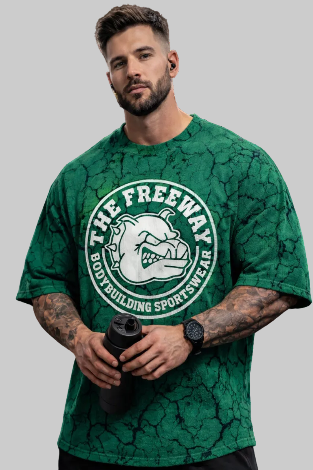 Men's green marbled rounded bodybuilding rag top by Thefreeway Sportswear worn by a male model, front view with large white logo