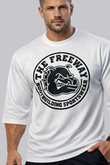 Men's white rounded bodybuilding rag top Thefreeway Sportswear art. 2272 worn by a male model, front close-up with large black logo