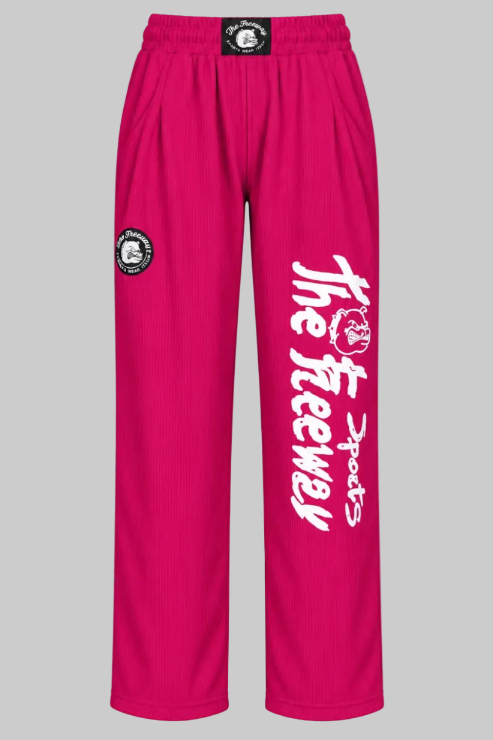 Thefreeway unisex training pants in fuchsia worn by a female model, full-body front view