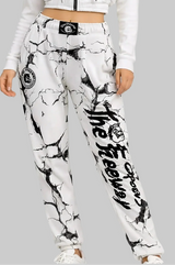 Thefreeway unisex training pants in marbled white worn by a female model, front view