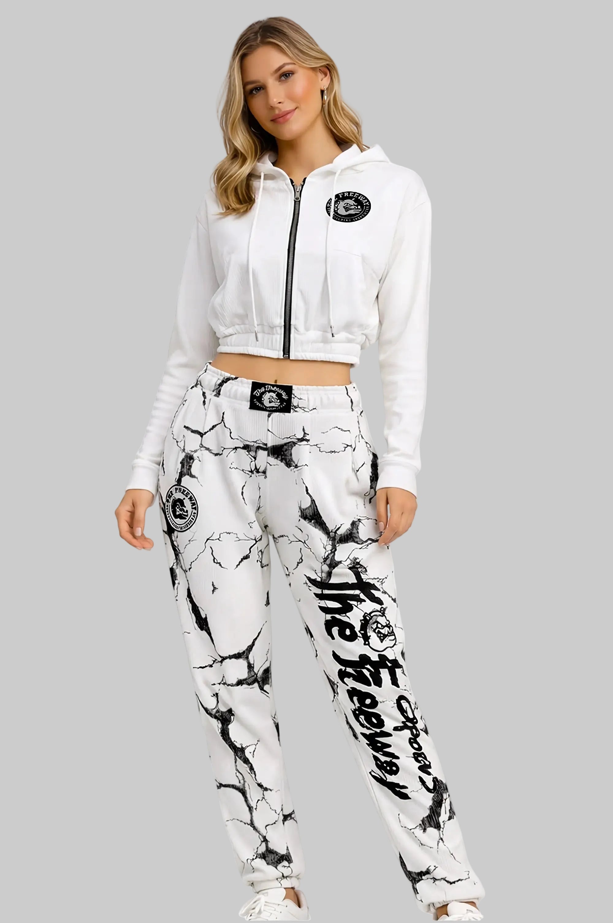 Unisex white marbled bodybuilding training pants Thefreeway Sportswear art. 252 worn by a female model with matching white hoodie, front view