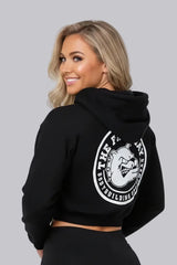 Thefreeway Art.6586 women's hooded jacket in black worn by a female model, three-quarter back view showing the large rear logo