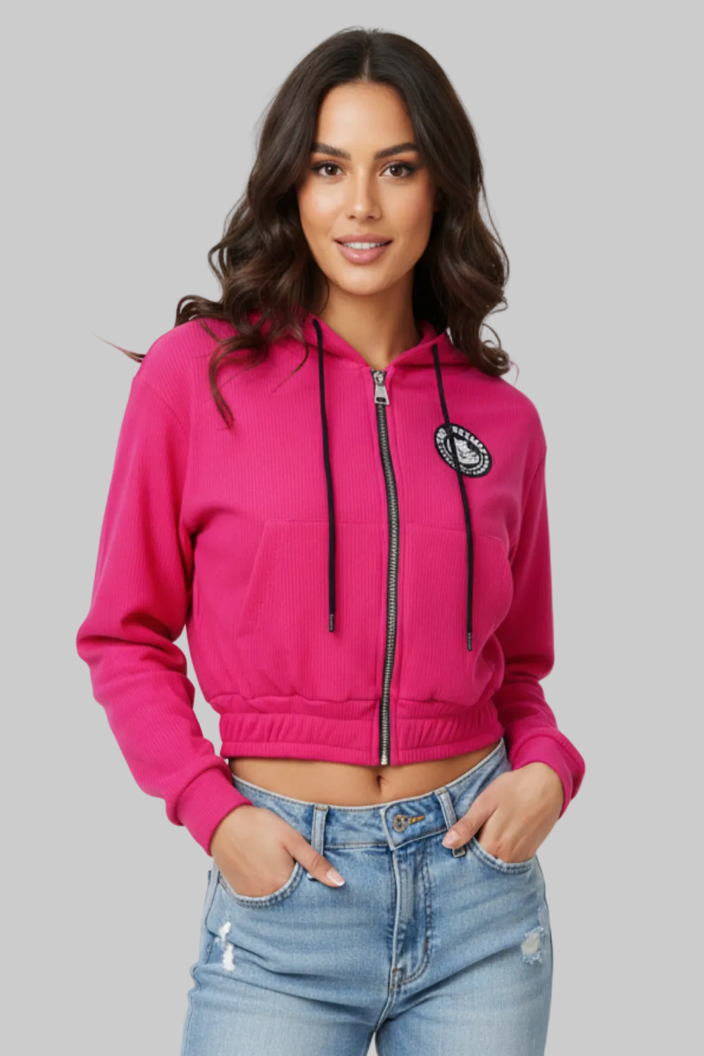 Thefreeway Art.6586 women's hooded jacket in fuchsia worn by a female model with jeans, front view with zip closed