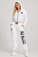 Thefreeway Art.7870 women's white training suit worn by a female model, full-body front view with hood up